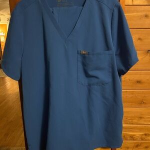 Barley worn royal blue FIG scrub set